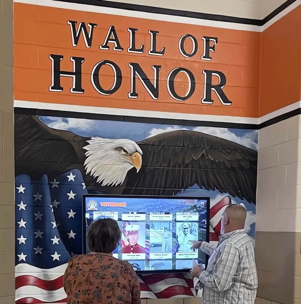 Honoring Veterans Day: Complete Guide to Military Wall of Honor Recognition Programs for Schools and Alumni